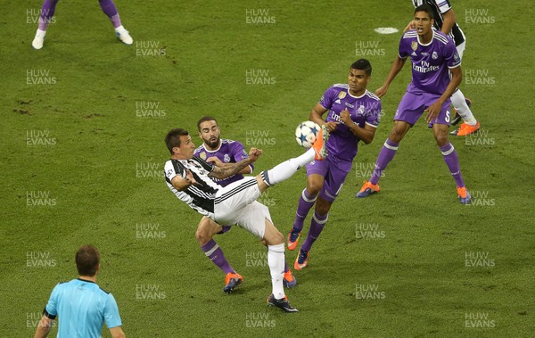 030617 - UEFA Champions League Final - Juventus v Real Madrid - Mario Mandzukic of Juventus scores a goal with an over head kick