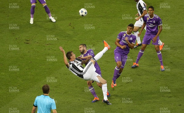 030617 - UEFA Champions League Final - Juventus v Real Madrid - Mario Mandzukic of Juventus scores a goal with an over head kick