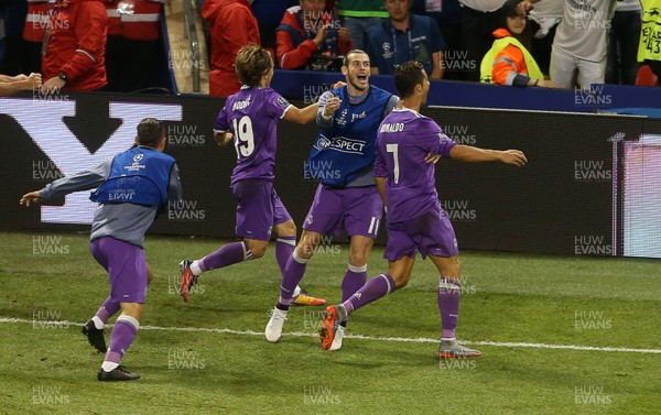 030617 - UEFA Champions League Final - Juventus v Real Madrid - Cristiano Ronaldo of Real Madrid celebrates scoring a goal with Gareth Bale