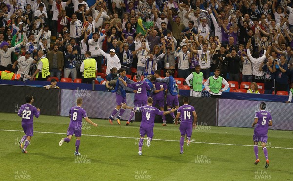 030617 - UEFA Champions League Final - Juventus v Real Madrid - Cristiano Ronaldo of Real Madrid celebrates scoring a goal with Gareth Bale and team mates