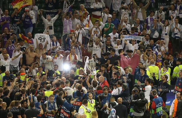 030617 - UEFA Champions League Final - Juventus v Real Madrid - The trophy is lifted