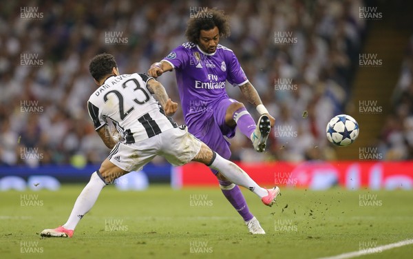 030617 - Juventus v Real Madrid, UEFA Champions League Final, Cardiff - Marcelo of Real Madrid is challenged by Dani Alves of Juventus