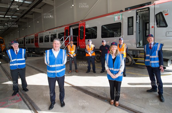 150421 Labour Leader Sir Keir Starmer MP, second left, with Welsh Labour Leader and First Minister Mark Drakeford, left; John Griffiths, Newport East Labour Senedd Candidate, right, and Jayne Bryant Welsh Labour Senedd candidate for Newport West during a visit to CAF in Newport to see one of the Transport for Wales trains under construction