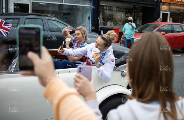 030921 - Picture shows the crowds out in Blackwood to welcome local heros Lauren Williams and Lauren Price who are taken around the town in an open top car to celebrate their success at the Tokyo games
