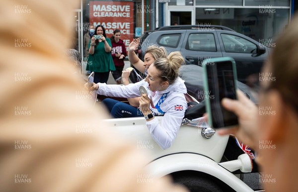 030921 - Picture shows the crowds out in Blackwood to welcome local heros Lauren Williams and Lauren Price who are taken around the town in an open top car to celebrate their success at the Tokyo games