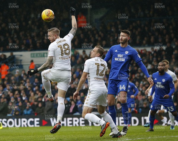 030218 - Leeds United v Cardiff City - Sky Bet Championship -  Pontus Jansson of Leeds United heads away from threat of Gary Madine of Cardiff