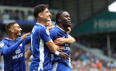 060823 - Leeds United v Cardiff City - Sky Bet Championship - Ike Ugbo of Cardiff celebrates scoring their second goal with Callum O'Dowda of Cardiff and Ryan Wintle of Cardiff