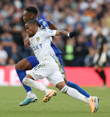 060823 - Leeds United v Cardiff City - Sky Bet Championship - Ebou Adams of Cardiff and Crysencio Summerville of Leeds United