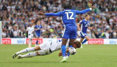 060823 - Leeds United v Cardiff City - Sky Bet Championship - Ike Ugbo of Cardiff and Charlie Cresswell of Leeds United