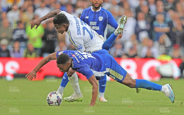 060823 - Leeds United v Cardiff City - Sky Bet Championship - Ebou Adams of Cardiff and Luis Sinisterra of Leeds United tussle for the ball