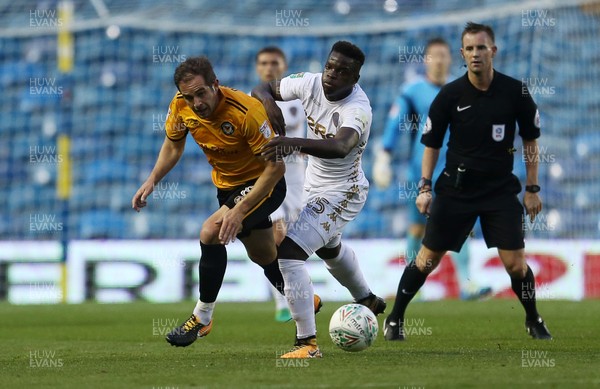 220817 - Leeds United v Newport County - Carabao Cup - Matthew Dolan of Newport County is tackled by Ronaldo Vieira of Leeds United