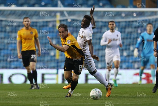 220817 - Leeds United v Newport County - Carabao Cup - Matthew Dolan of Newport County is tackled by Ronaldo Vieira of Leeds United