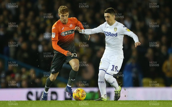 130219 - Leeds United v Swansea City - SkyBet Championship - Pablo Hernandez of Leeds is challenged by Jay Fulton of Swansea City