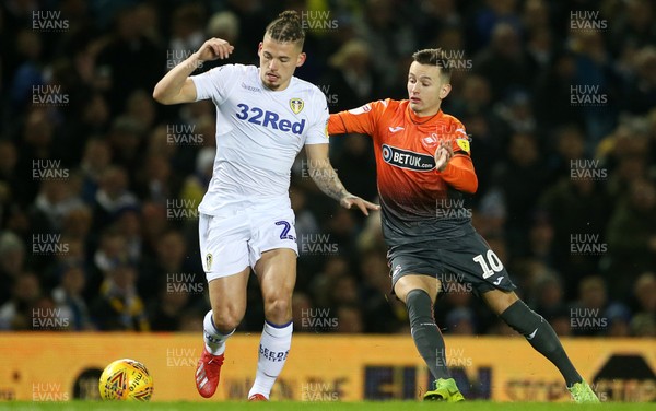 130219 - Leeds United v Swansea City - SkyBet Championship - Kalvin Phillips of Leeds is challenged by Bersant Celina of Swansea City