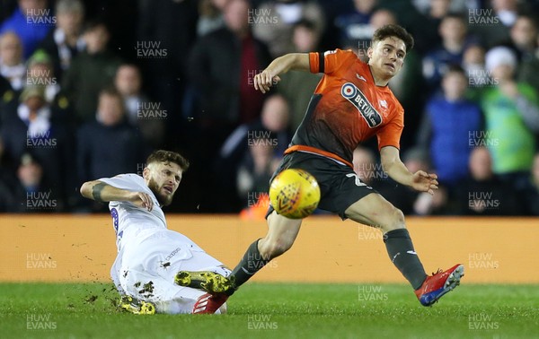 130219 - Leeds United v Swansea City - SkyBet Championship - Daniel James of Swansea City is tackled by Mateusz Klich of Leeds
