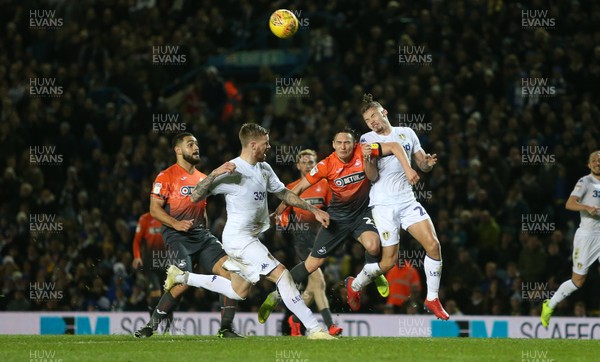 130219 - Leeds United v Swansea City - SkyBet Championship - Connor Roberts of Swansea City collides with Kalvin Phillips of Leeds