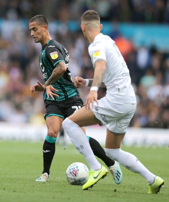 310819 - Leeds United v Swansea City - Sky Bet Championship -  Yan Dhanda  of Swansea is caught by Stuart Dallas of Leeds United