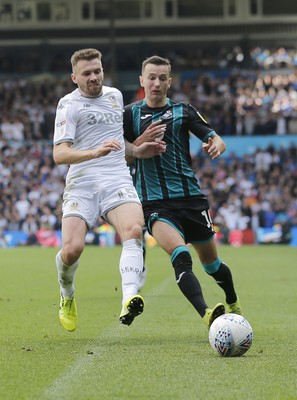 310819 - Leeds United v Swansea City - Sky Bet Championship -  Besant Celina of Swansea and Stuart Dallas of Leeds United chase the ball  