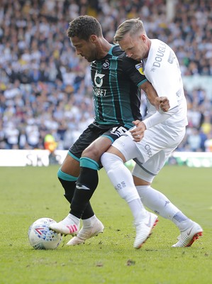 310819 - Leeds United v Swansea City - Sky Bet Championship -  Wayne Routledge of Swansea and Barry Douglas of Leeds United