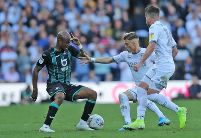 310819 - Leeds United v Swansea City - Sky Bet Championship -  Andre Ayew of Swansea is caught by Ezgjan Alioski of Leeds United