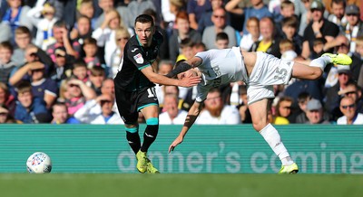 310819 - Leeds United v Swansea City - Sky Bet Championship -  Besant Celina of Swansea tussles with Stuart Dallas of Leeds United