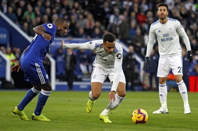 291218 - Leicester City v Cardiff City, Premier League - Josh Murphy of Cardiff City (centre) and Ricardo Pereira of Leicester City (left) battle for the ball