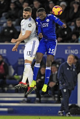 291218 - Leicester City v Cardiff City, Premier League - Callum Paterson of Cardiff City (left) and Wilfred Ndidi of Leicester City battle for the ball