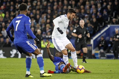 291218 - Leicester City v Cardiff City, Premier League - Victor Camarasa of Cardiff City (right) is tackled by Nampalys Mendy of Leicester City