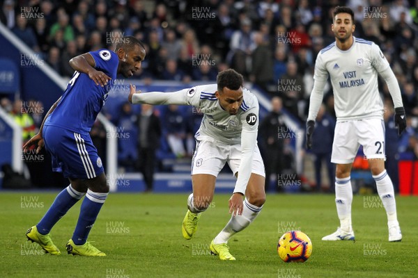 291218 - Leicester City v Cardiff City, Premier League - Josh Murphy of Cardiff City (centre) and Ricardo Pereira of Leicester City (left) battle for the ball