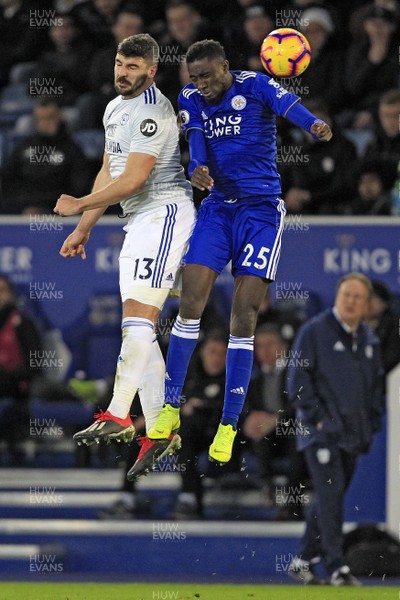 291218 - Leicester City v Cardiff City, Premier League - Callum Paterson of Cardiff City (left) and Wilfred Ndidi of Leicester City battle for the ball