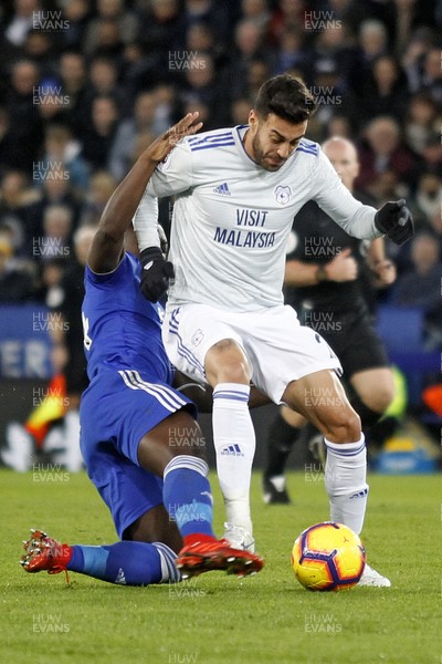 291218 - Leicester City v Cardiff City, Premier League - Victor Camarasa of Cardiff City (right) is tackled by Nampalys Mendy of Leicester City