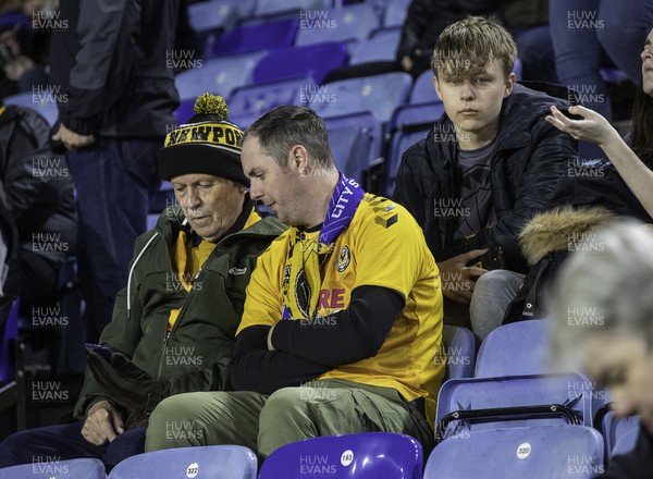 081122 - Leicester City v Newport County - Carabao Cup Third Round - Newport fans checking a phone