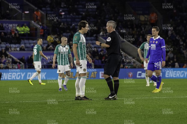 081122 - Leicester City v Newport County - Carabao Cup Third Round - Aaron Lewis of Newport gets a talking to from Referee Darren Bond 