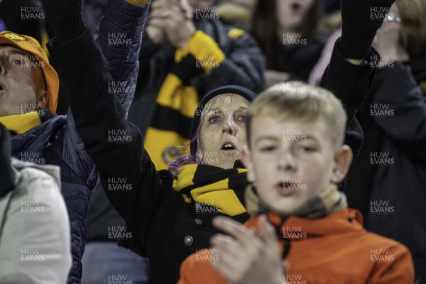 081122 - Leicester City v Newport County - Carabao Cup Third Round - A Newport fan sings at full time 