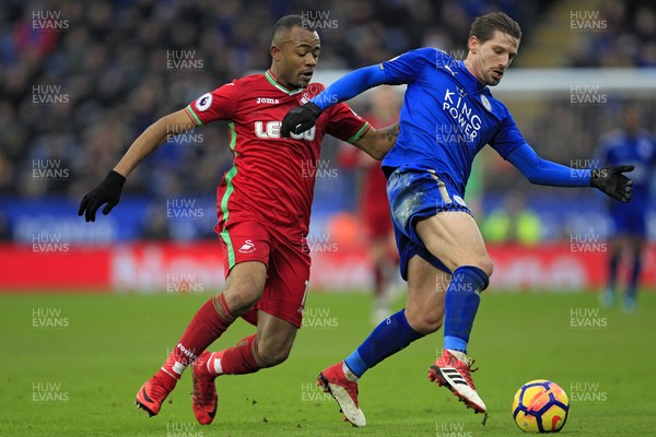 030218 - Leicester City v Swansea City, Premier League - Jordan Ayew of Swansea City (left) in action with Adrien Silva of Leicester City