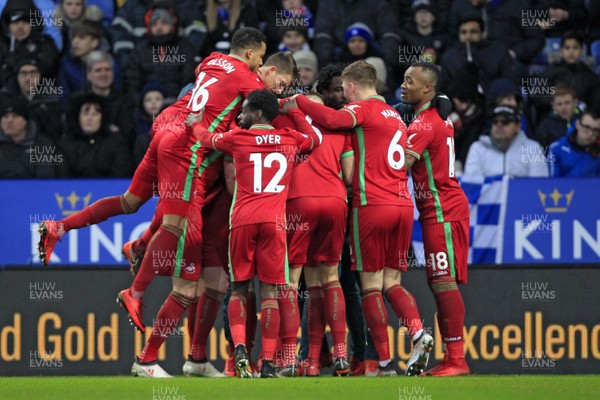 030218 - Leicester City v Swansea City, Premier League - Federico Fernandez of Swansea City (hidden) celebrates scoring his side's first goal with team mates