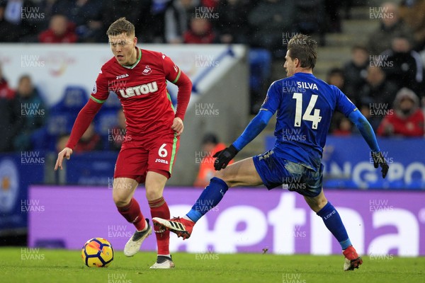 030218 - Leicester City v Swansea City, Premier League - Alfie Mawson of Swansea City (left) in action with  Adrien Silva of Leicester City