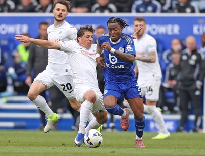 110426 - Leicester City v Swansea City - Sky Bet Championship - Goncalo Franco of Swansea clashes with Abdul Fatal of Leicester
