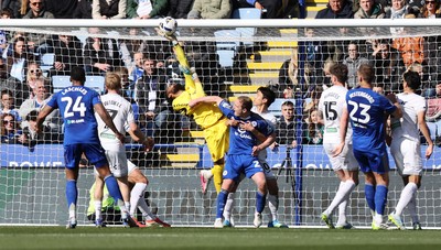 110426 - Leicester City v Swansea City - Sky Bet Championship - Goalkeeper Lawrence Vigouroux of Swansea makes great save from Oliver Skipp of Leicester with help from Eom Ji-sung of Swansea