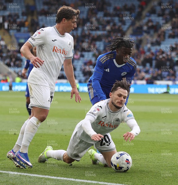 110426 - Leicester City v Swansea City - Sky Bet Championship - Liam Cullen of Swansea is caught by Jeremy Monga of Leicester
