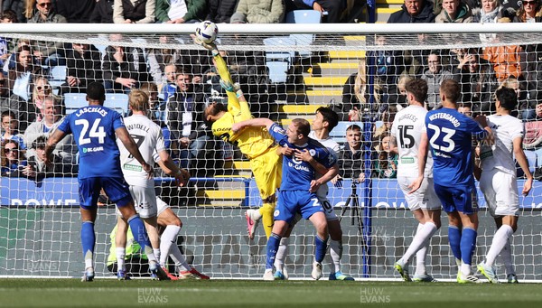 110426 - Leicester City v Swansea City - Sky Bet Championship - Goalkeeper Lawrence Vigouroux of Swansea makes great save from Oliver Skipp of Leicester with help from Eom Ji-sung of Swansea