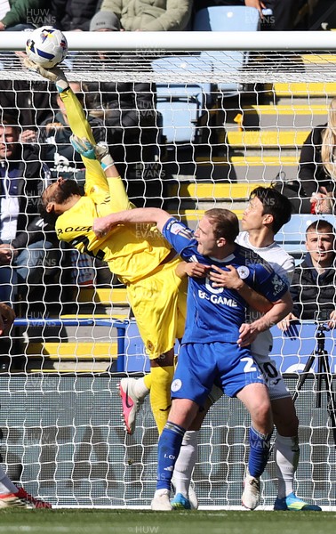 110426 - Leicester City v Swansea City - Sky Bet Championship - Goalkeeper Lawrence Vigouroux of Swansea makes great save from Oliver Skipp of Leicester with help from Eom Ji-sung of Swansea