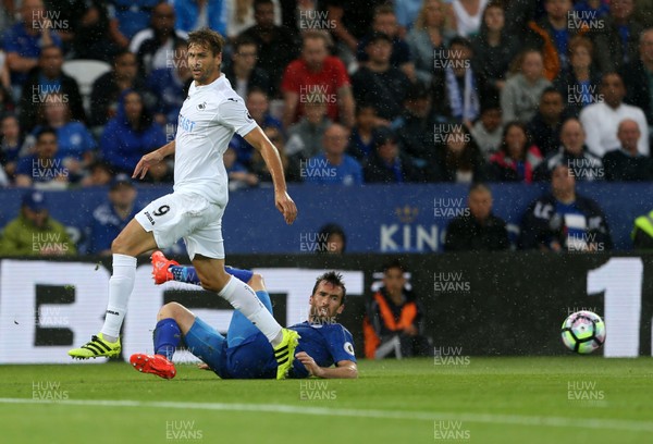 270816 - Leicester City v Swansea City - Premier League - Fernando Llorente of Swansea City can't get past Christian Fuchs of Leicester