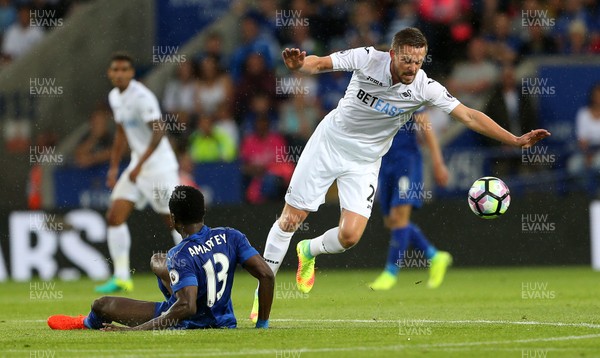 270816 - Leicester City v Swansea City - Premier League - Gylfi Sigurdsson of Swansea City goes past Daniel Amartey of Leicester