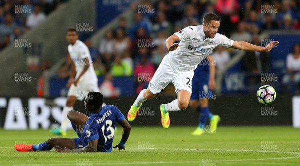 270816 - Leicester City v Swansea City - Premier League - Gylfi Sigurdsson of Swansea City goes past Daniel Amartey of Leicester