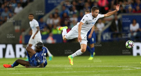 270816 - Leicester City v Swansea City - Premier League - Gylfi Sigurdsson of Swansea City goes past Daniel Amartey of Leicester