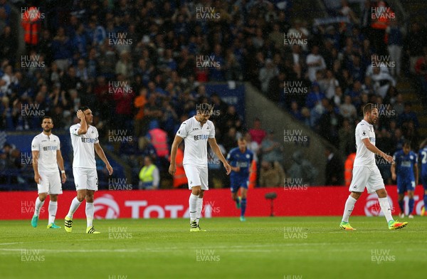 270816 - Leicester City v Swansea City - Premier League - Dejected Jack Cork, Fernando Llorente and Gylfi Sigurdsson of Swansea City