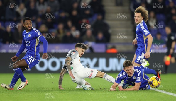 300124 - Leicester City v Swansea City - Sky Bet Championship - Jamie Paterson of Swansea with Ricardo Pereira of Leicester City and Jannik Vestergaard of Leicester City and Wout Faes of Leicester City