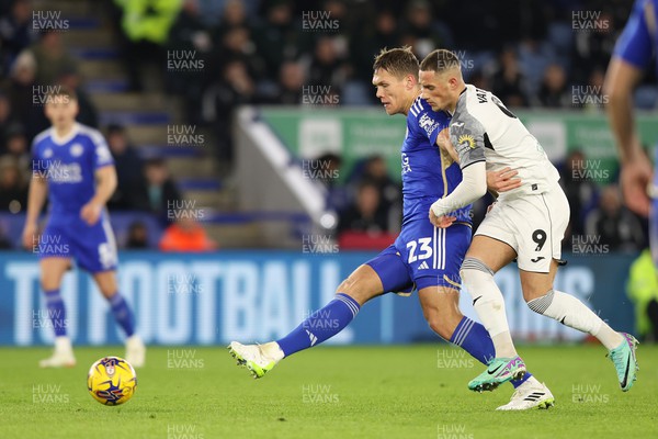 300124 - Leicester City v Swansea City - Sky Bet Championship - Jerry Yates of Swansea and Jannik Vestergaard of Leicester City