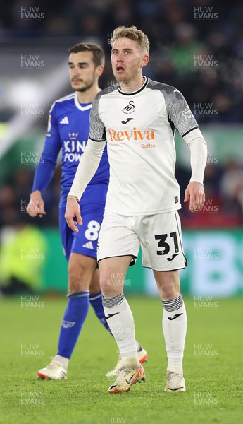 300124 - Leicester City v Swansea City - Sky Bet Championship - Oli Cooper of Swansea and Harry Winks of Leicester City